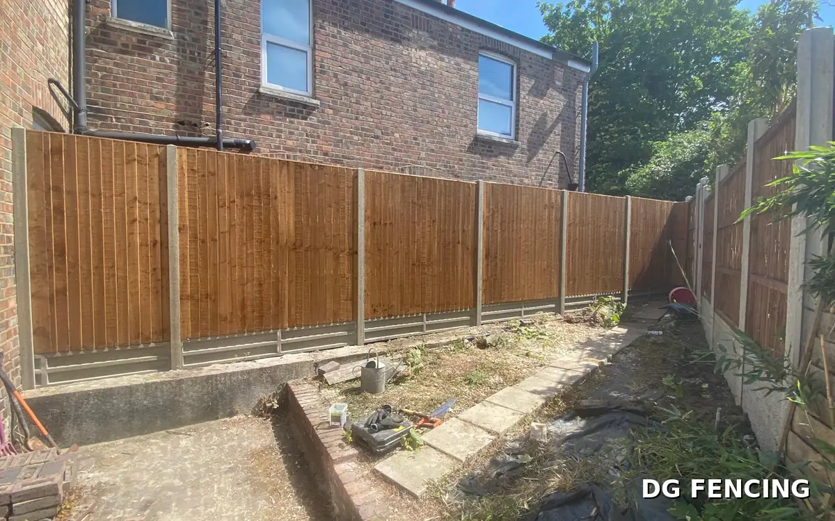 After: new closeboard fencing installed along the garden boundary