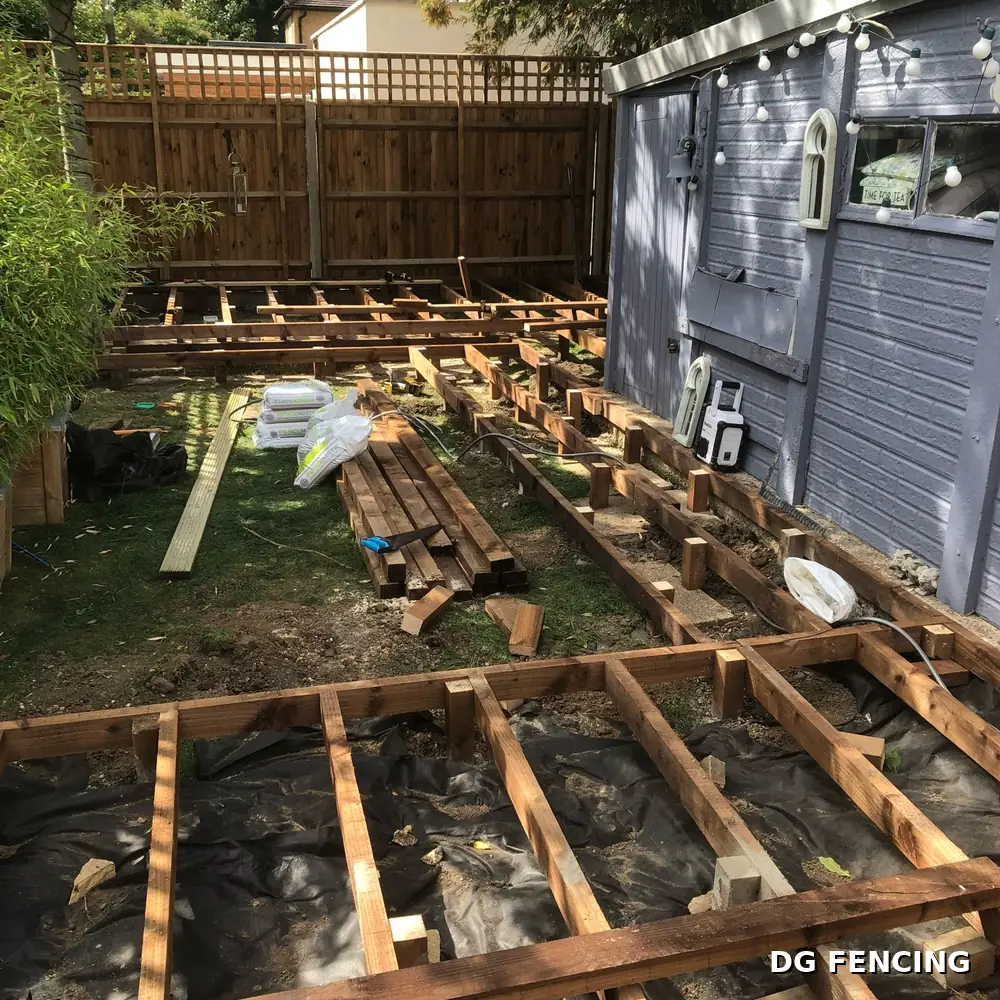 Before: the same garden with the timber decking subframe under construction