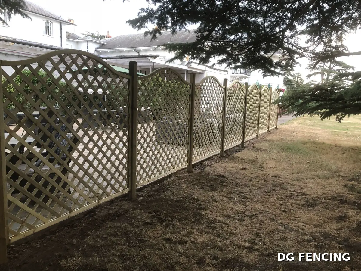 Curved-top decorative lattice screens along a patio seating area