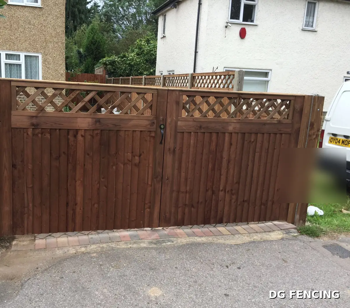Double timber driveway gates with lattice tops